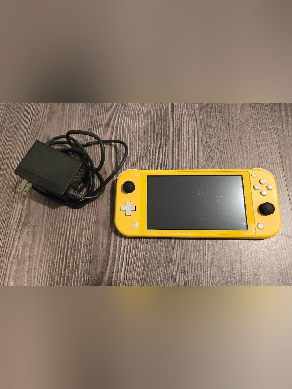 Pre-Owned Nintendo Switch Lite In Yellow With Charger
